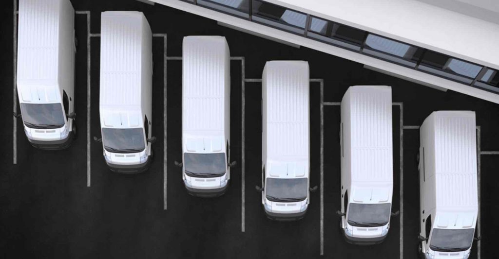 profile image of a fleet of white vans